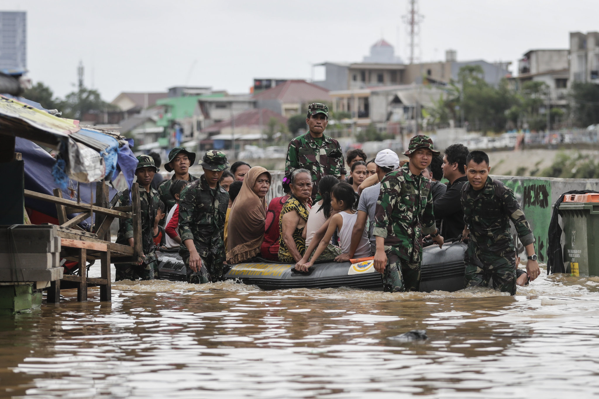 Indonesia landslides and floods kill 75 including dozens missing